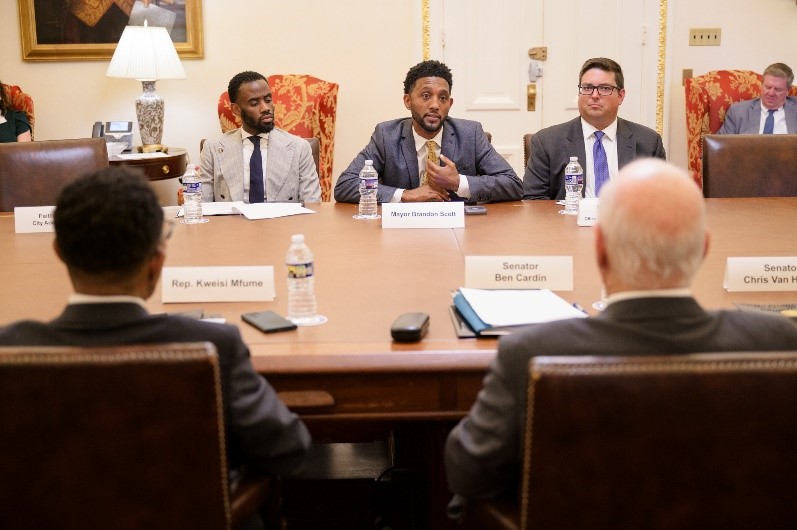 Mayor Brandon M. Scott at conference table